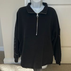 Pink black pullover.